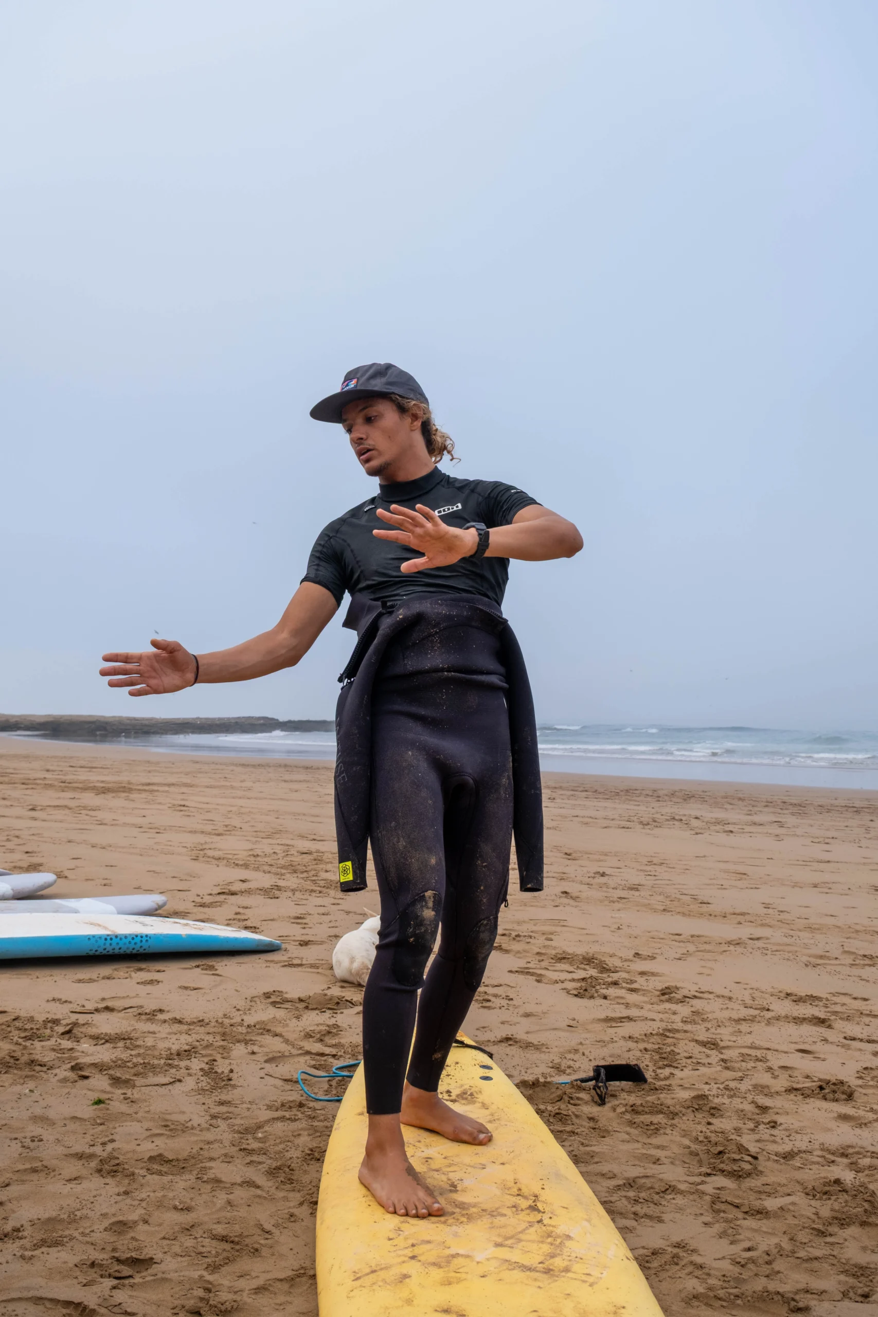Surf coaching session on Imsouane beach Morocco with professional surf coach